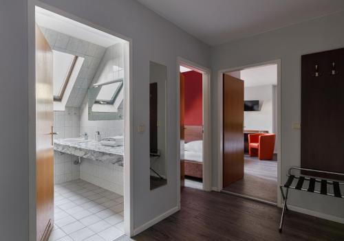 Kuchyň nebo kuchyňský kout v ubytování Hotel Nova