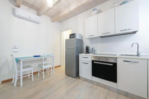 Η κουζίνα ή μικρή κουζίνα στο Appartamenti La perla