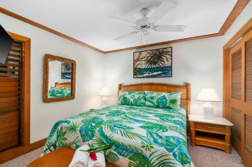 a bedroom with a bed and a ceiling fan at 1st Floor Kiahuna 1br Condo, Garden View, Athletic Club KP422 in Koloa