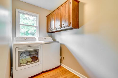a laundry room with a washer and dryer at Pet-Friendly Decatur Vacation Rental with Patio! in Decatur