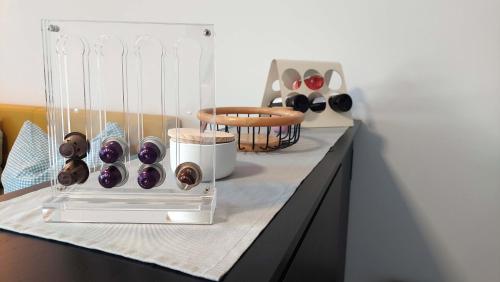 a shelf with a bunch of donuts on a counter at Markus Apartment in Strobl