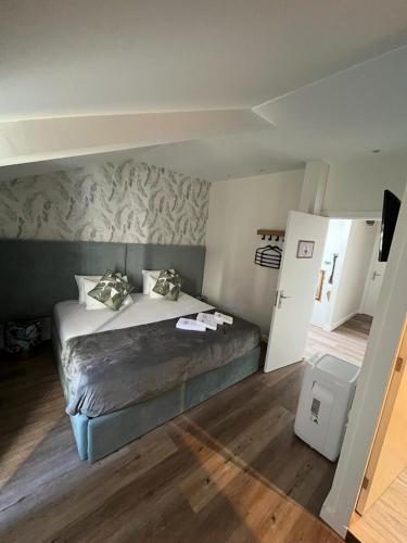 Postel nebo postele na pokoji v ubytování Junqueira76 Guesthouse