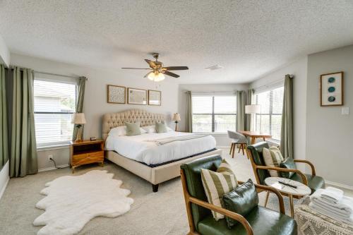 a bedroom with a bed and a ceiling fan at Luxe San Antonio Vacation Rental with Private Pool! in San Antonio