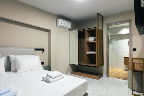 Postel nebo postele na pokoji v ubytování Isla Villas & Suites