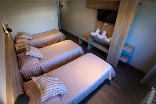 Postel nebo postele na pokoji v ubytování Hotel 7 Lagos