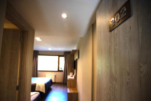 Postel nebo postele na pokoji v ubytování Hotel 7 Lagos