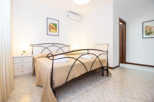 Ένα ή περισσότερα κρεβάτια σε δωμάτιο στο Isla Country Apartments Alghero