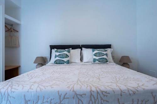 Postel nebo postele na pokoji v ubytování Amamì B&B