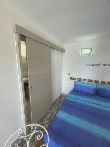 Ένα ή περισσότερα κρεβάτια σε δωμάτιο στο Casavacanze Donato