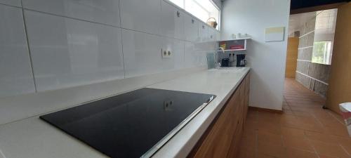 Η κουζίνα ή μικρή κουζίνα στο Casa Xoubiña