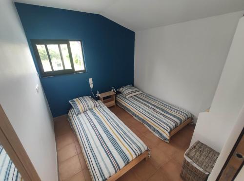 Postel nebo postele na pokoji v ubytování 2 Maisons de 3 et 2 chambres avec grande piscine commune