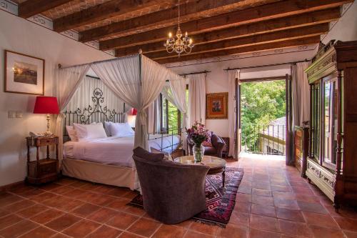 Un pat sau paturi într-o cameră la Villa Santa Mónica
