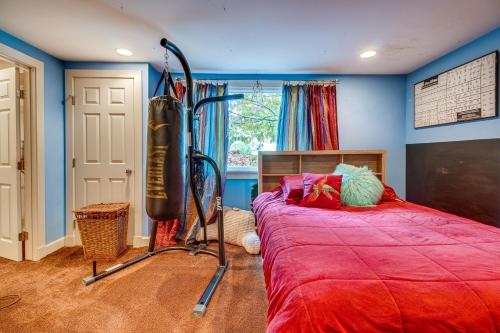 a bedroom with a large bed and a blow at Pet-Friendly Fort Thomas Vacation Rental with Deck! 