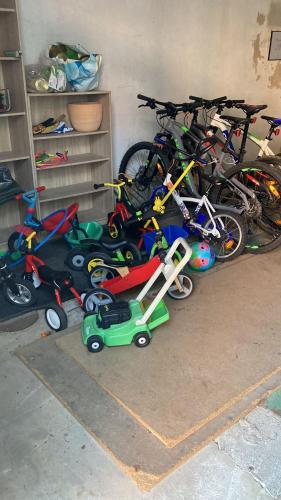 a bunch of bikes parked in a garage at Haus Brandenburg in Stechlin