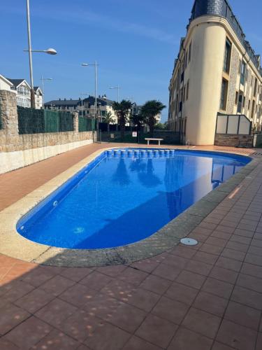 Bazén v ubytování Las Catedrales ático Oceano VI nebo v jeho okolí