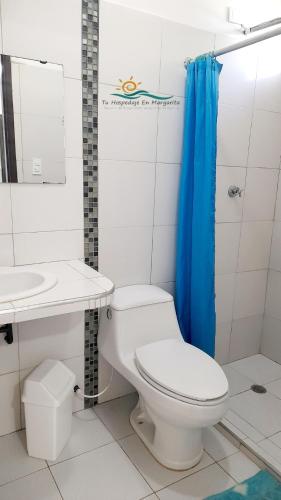 ห้องน้ำของ Posada Villa Mayo Apartamento7 familiar a 5 Min de Playa Parguito