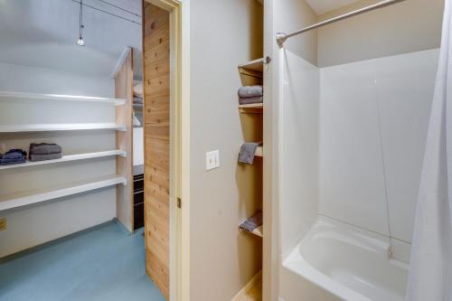 a walk in closet with a tub and a sink at Ketchum Mountain Retreat Central Location! in Ketchum