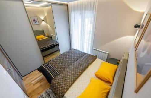 En eller flere senge i et værelse på The Alpinist