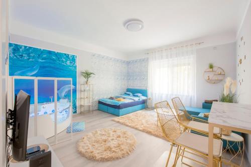 a living room with a dolphin themed bedroom at AquaFlat Gold in Budapest