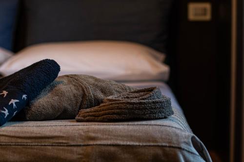 a close up of a pillow on a bed at Selva Castalda in Tuscania