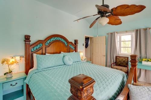 a bedroom with a bed and a ceiling fan at Key West Paradise with Private Pool and Ocean View in Cudjoe Key