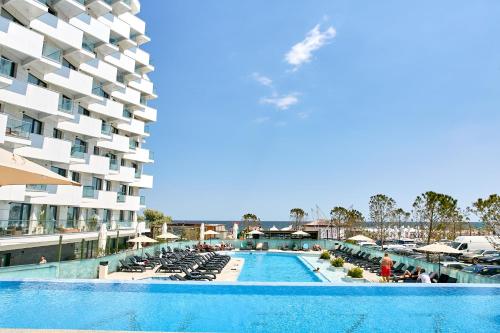 a view of the pool at a resort at Unique Sea View Infinity Pool & Spa in Mamaia Nord