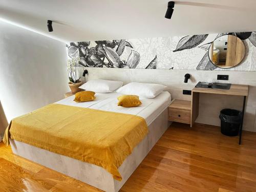Posteľ alebo postele v izbe v ubytovaní MEMORI bed&breakfast