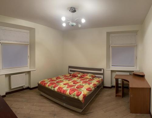 Кровать или кровати в номере Gintautas apartment