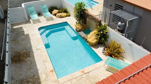 an overhead view of a swimming pool on a building at R&V Combate Beach House 1 with Pool in Cabo Rojo