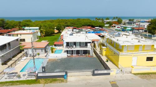 an aerial view of a house with a pool at R&V Combate Beach House 1 with Pool in Cabo Rojo