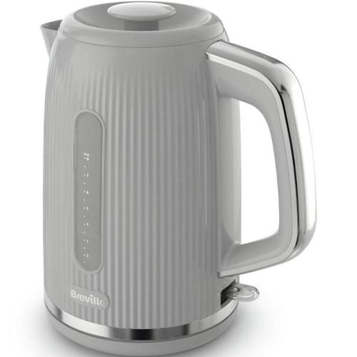 a white electric kettle on a white background at Luxurious Detached Holiday House Free Parking near Airport Town Centre Railway Station in Luton