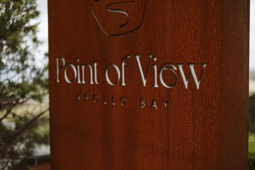 a wooden post with the words tomb of view audoriabay at Point of View Villas in Apollo Bay