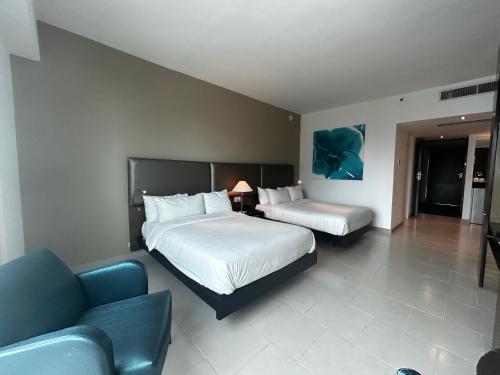 Cama o camas de una habitación en Decapolis Hotel Panama City