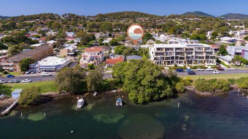 an aerial view of a small island in a body of water at Douglas Avenue 5 in Forster