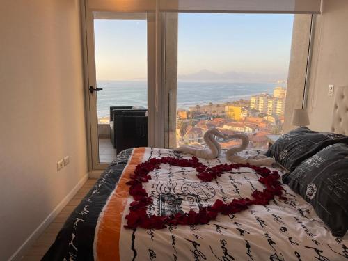 Ένα ή περισσότερα κρεβάτια σε δωμάτιο στο Honeymoon Apartment Club Océano
