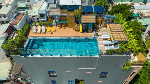 an overhead view of a building with a swimming pool at Seahorse Signature Danang Hotel by Haviland in Da Nang