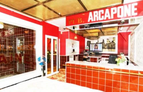 a fast food restaurant with a sign that reads arena poke at ホテル　アイネ　五條店 in Nohara
