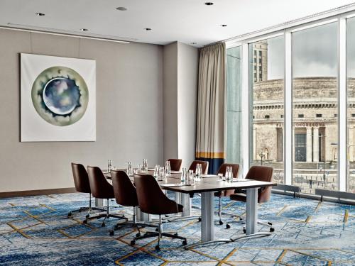 a conference room with a table and chairs at InterContinental Warszawa by IHG in Warsaw