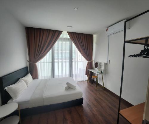 Ένα ή περισσότερα κρεβάτια σε δωμάτιο στο My Misto Homestay, Riverson Soho
