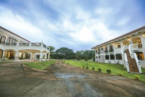 a view of the courtyard of a building at The Suites @ Bellavista in Isabel