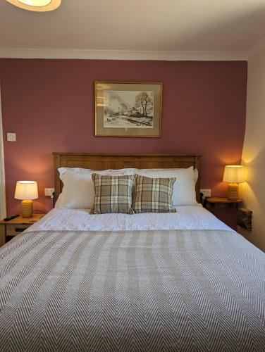 Letto o letti in una camera di Whittakers Barn Farm Bed and Breakfast
