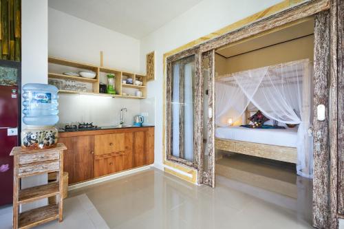 Una cocina o cocineta en Arungan Villas