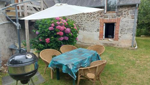 Taman di luar appartement au calme