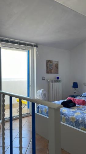 Postel nebo postele na pokoji v ubytování Casasullaspiaggia_roma