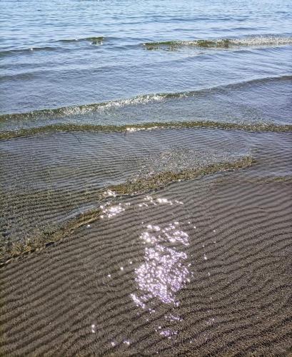 a heart drawn in the sand on the beach at La Foggia seaside paradise in Siculiana
