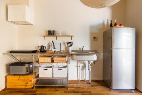 Una cocina o cocineta en Temple Hotel 南アルプス法源寺