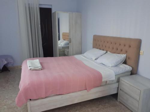 Postel nebo postele na pokoji v ubytování Guest house LIA