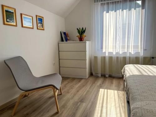 Кровать или кровати в номере Apartma Kenda