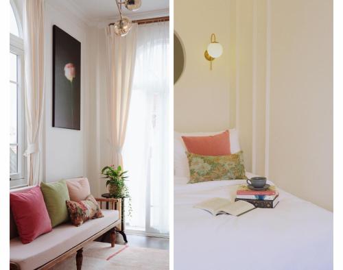 a living room with a couch and a window at Le Macaron City Center - Boutique Hotel Đà Lạt in Da Lat