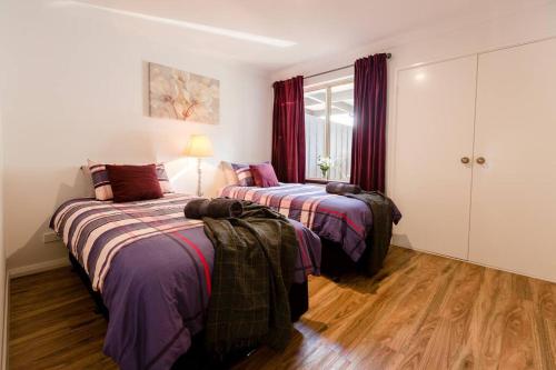 Katil atau katil-katil dalam bilik di Maison Magnolia; Character Townhouse in the centre of Margaret River